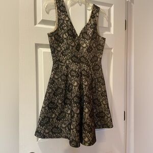 Blue rain black and cream colored lace dress